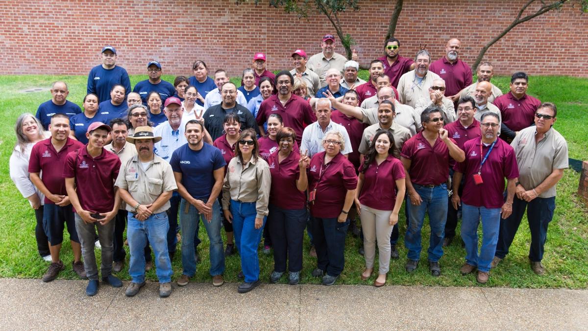 A group photo of the facilities services staff.